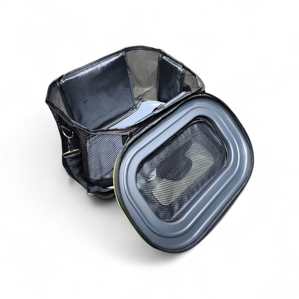 Maroc-animalerie black and lime green portable pet travel bag with mesh ventilation and secure zippered closure.