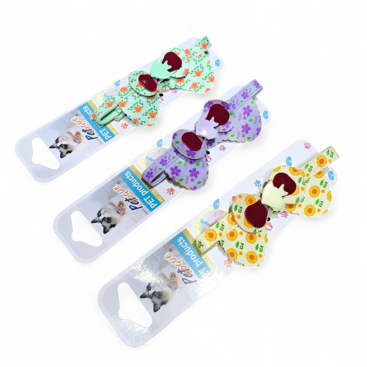 maroc-animalerie pet bow tie collars in floral patterns: green with orange flowers, purple with flowers, and yellow with sunflowers. Adjustable fabric accessory.