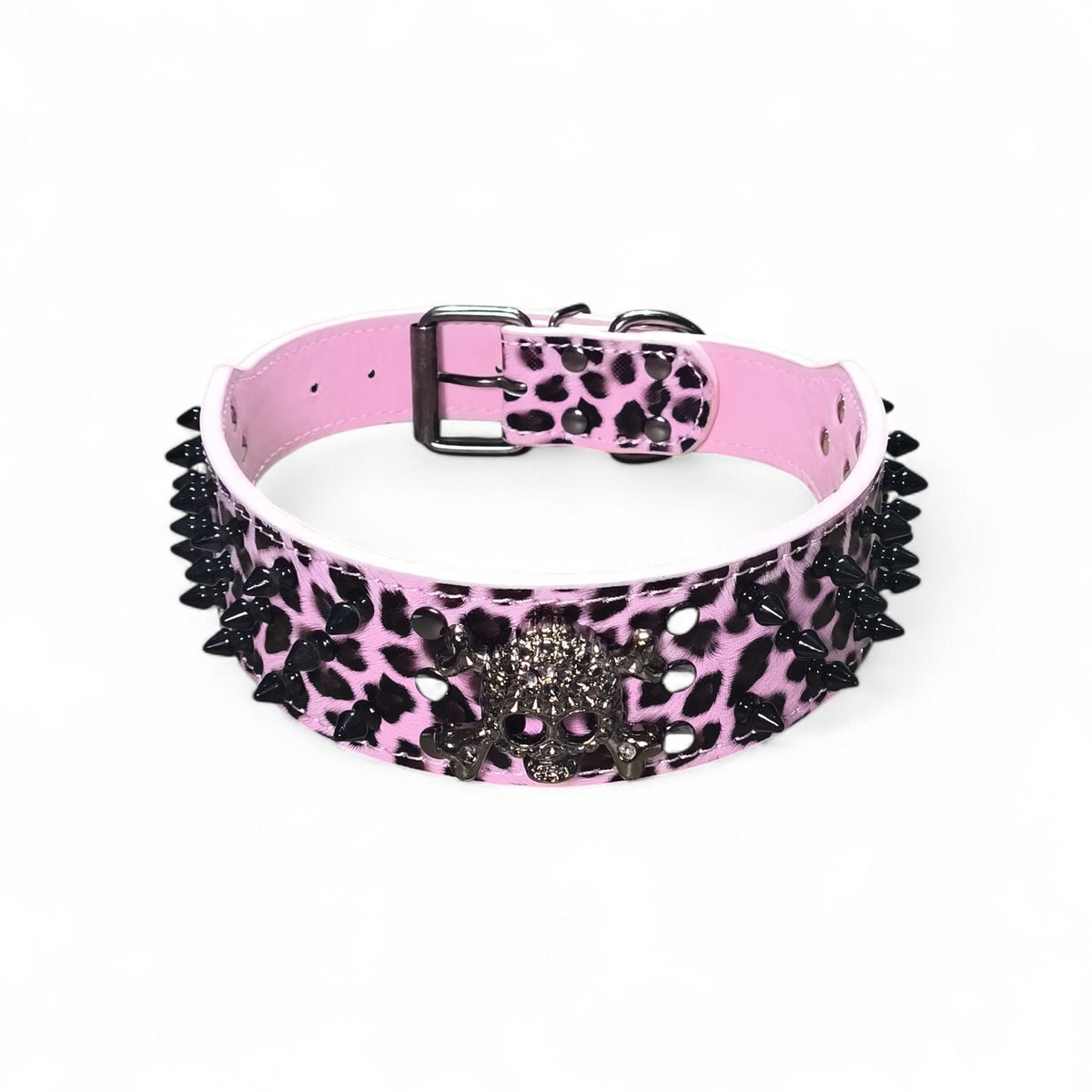 Maroc-animalerie pink leopard print faux leather dog collar with black spikes and skull charm. Adjustable buckle.