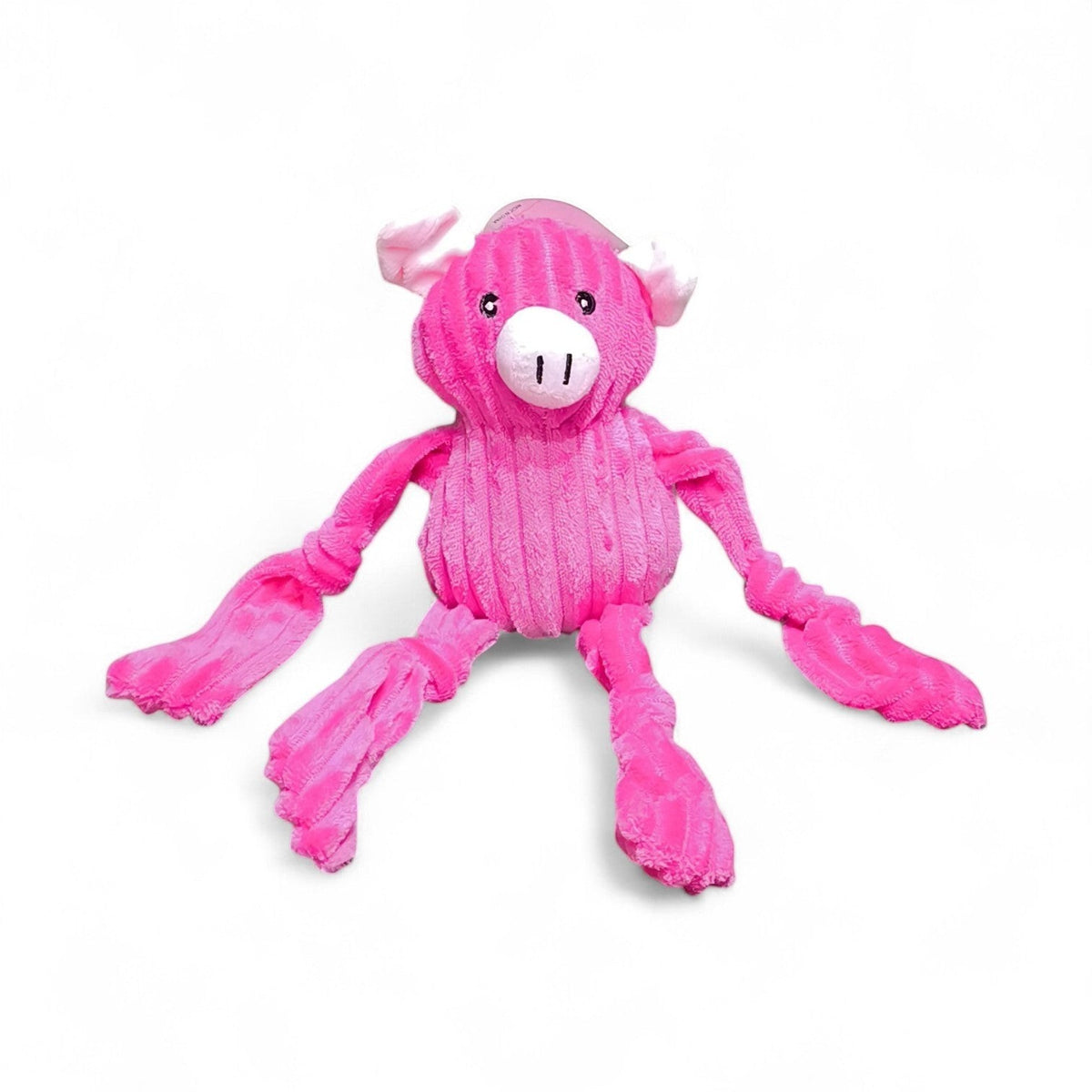 Maroc-animalerie pink plush squeaky pig dog toy with long floppy limbs and corduroy-like fabric.