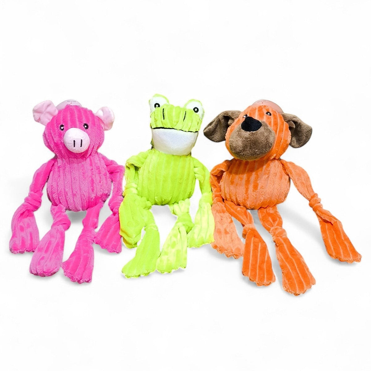 Maroc-animalerie plush squeaky dog toys in pink pig, green frog, and orange dog shapes. Made from corduroy-like fabric with floppy limbs.