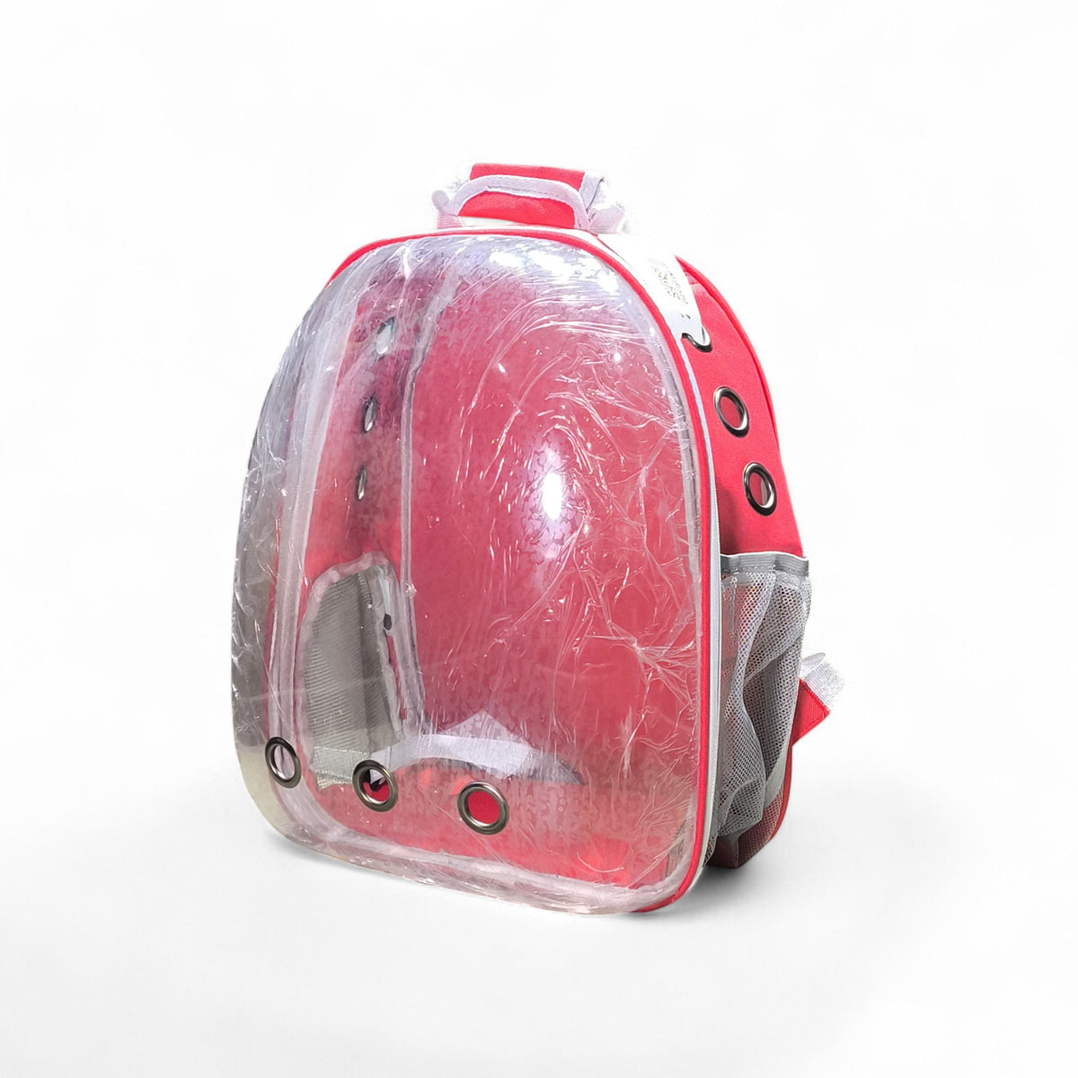 Maroc-animalerie red pet carrier backpack with clear bubble front and mesh side pockets for travel or transport.