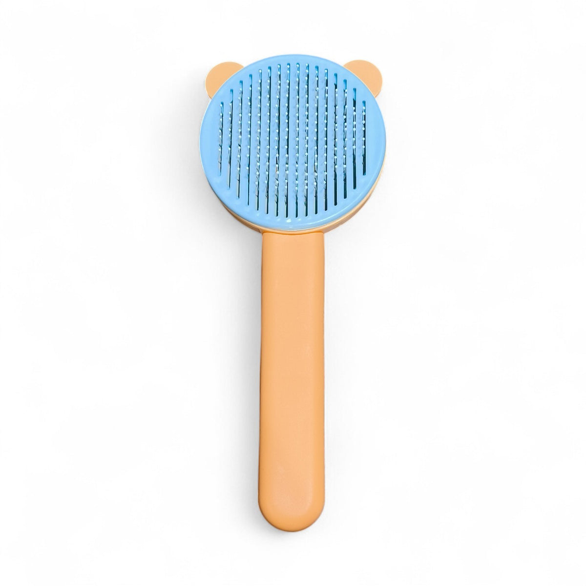 Maroc-animalerie self-cleaning pet grooming brush with blue bristles and orange handle, featuring a cute bear design.